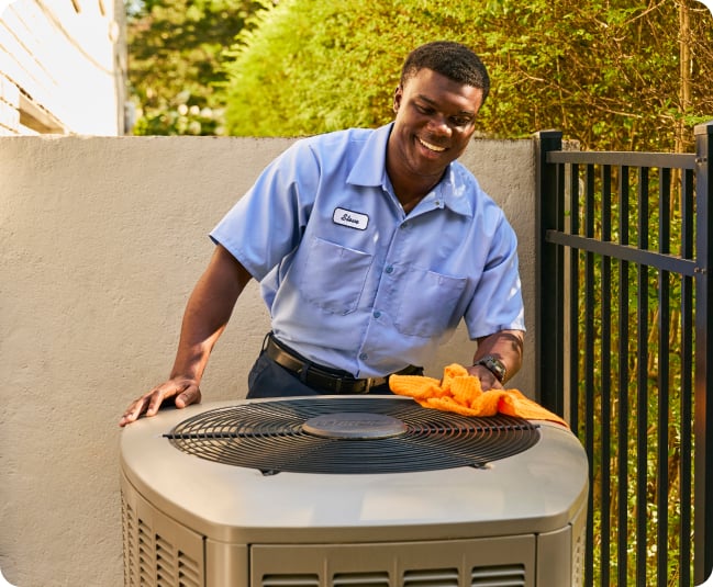 Repairman fixing AC